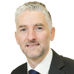 Headshot of Joe Brady