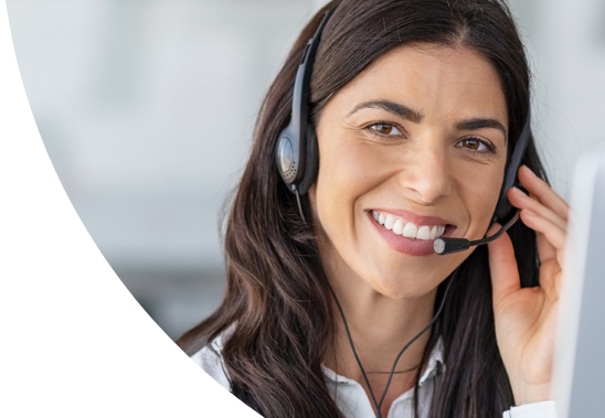 Headshot of a smiling receptionist wearing a headset