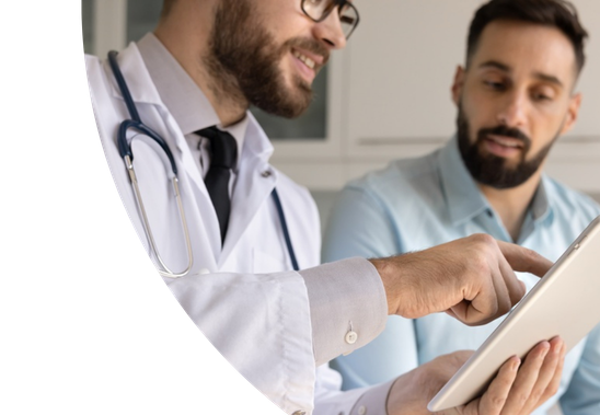 Patient and doctor reviewing health reports on a tablet